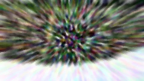 Abstrakte, radial verwischte Farbexplosion in Grün, Violett und Weiß mit mosaikartiger Struktur.