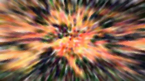 Abstrakte Komposition mit radialer Unschärfe in Orange, Gelb, Grün und Dunkelblau, die von einem hellen Zentrum nach außen strahlt.