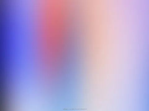 Unscharfer Farbverlauf von Blau über Rosa bis Hellorange, in der Mitte ein roter Schimmer.