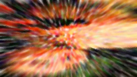 Radial verwischtes Bild mit orangen, roten und gelben Farbstreifen, die von der Mitte nach außen strahlen, dazwischen dunkle grüne Schlieren.