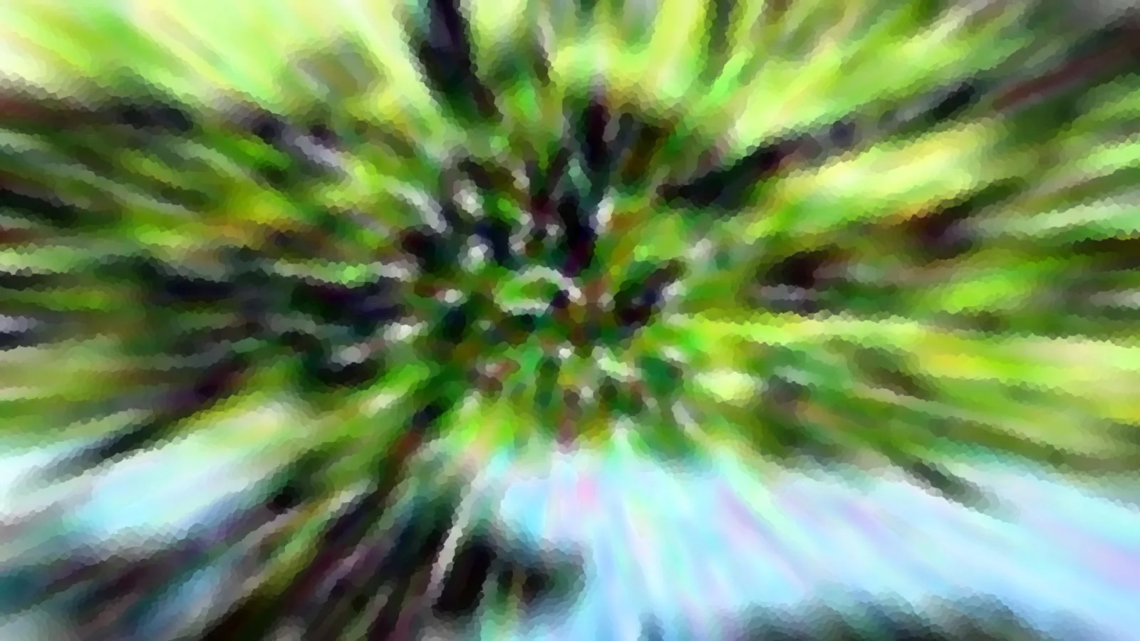 Abstrakte, radial verwischte Aufnahme in Grün, Weiß und Hellblau mit sichtbarem Pixelmuster.