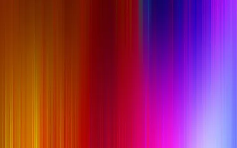 Abstrakter Verlauf aus vertikalen, verwischten Streifen, links orange und gelb, in der Mitte rot und magenta, rechts violett und blau.