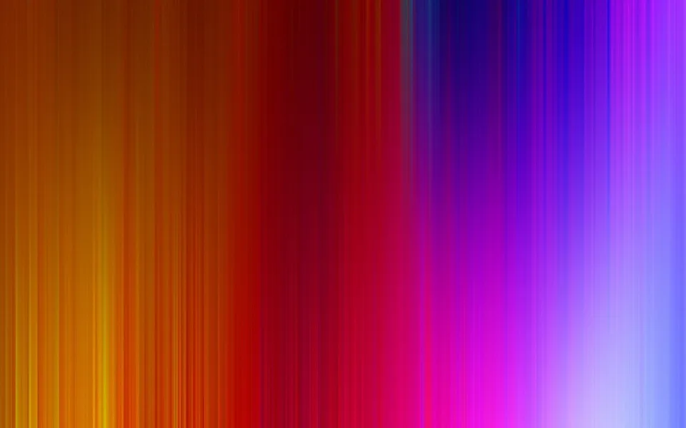 Abstrakter Verlauf aus vertikalen, verwischten Streifen, links orange und gelb, in der Mitte rot und magenta, rechts violett und blau.