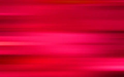 Abstrakter Hintergrund aus horizontalen, verschwommenen Streifen in Rot- und Pinktönen mit hellen Lichtbahnen.