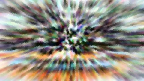 Abstrakte radiale Zoomunschärfe mit bunten Farbstreifen, die von einem hellen Zentrum nach außen laufen, mosaikartig gepixelt