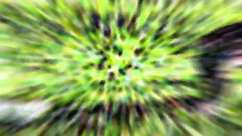 Abstrakte Komposition aus grünen und gelben Streifen, die von einem dunklen Zentrum radial nach außen laufen, pixelig verwischt.