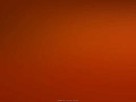 Weicher Farbverlauf von dunklem Rotbraun links oben zu leuchtendem Orangerot rechts, am unteren Rand winziger Schriftzug artboom.de