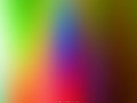 Unscharfer Farbverlauf mit grünen, gelben, orangen, roten, violetten und blauen Bereichen, nach rechts dunkler werdend.
