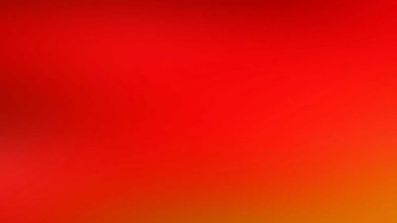 Weicher Farbverlauf von tiefem Rot links oben über Feuerrot bis zu Orange rechts unten, ohne erkennbare Formen.