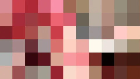 Abstraktes Raster aus farbigen Quadraten in Rot-, Rosa-, Braun- und Grautönen, mit einzelnen schwarzen und cremefarbenen Feldern.