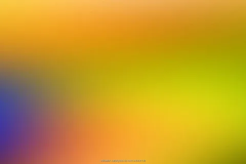 Unscharfer Farbverlauf von Orange und Gelb oben und rechts über Grün bis zu Blau und Violett links unten, ohne erkennbare Motive.