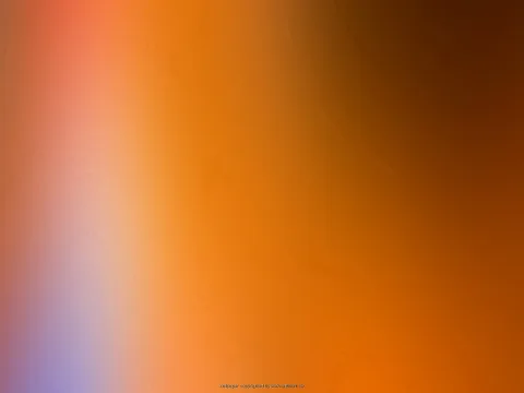 Abstrakter Farbverlauf in Orange, Braun und Lila mit weichen, verschwommenen Übergängen von links nach rechts.