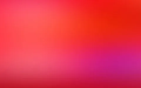 Unscharfer Verlauf von Rot über Pink bis Magenta, oben rechts intensiver, unten dunkler