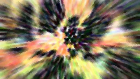 Abstraktes Bild mit bunten Strahlen, die von einem dunklen Zentrum radial nach außen verlaufen, in Gelb, Orange, Grün und Violett, leicht pixelig.