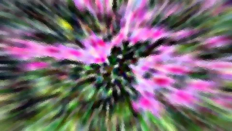 Abstrakte Aufnahme mit radialem Zoomeffekt, pinke und grüne Schlieren laufen auf einen dunklen Mittelpunkt zu.