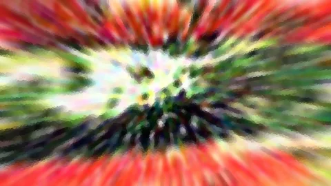 Abstrakte Komposition aus radial von einem Zentrum ausgehenden, verschwommenen Streifen in Rot, Grün, Gelb und Weiß, mit pixeligem Mosaikmuster.