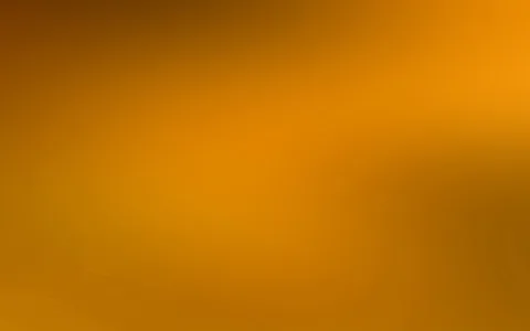 Weicher Farbverlauf in Orange und Ocker, dunkler am oberen und rechten Rand, heller im Zentrum.
