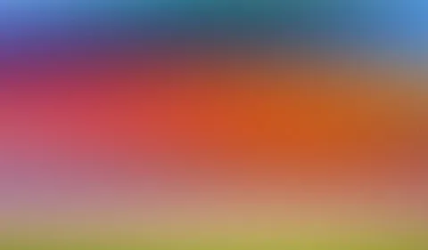 Weicher Farbverlauf von Blau und Violett oben über Rot und Orange bis zu Gelbgrün am unteren Rand.