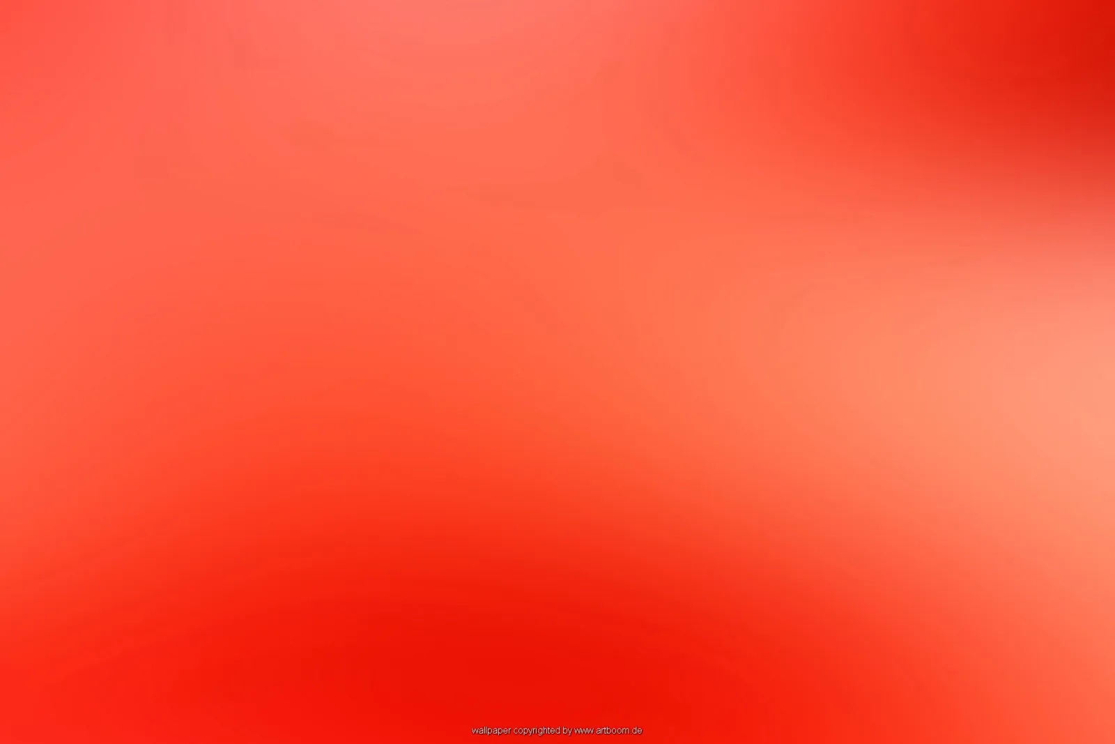 Weich verschwommene Farbfläche in Rot und Orange, heller im rechten Bereich, dunkler Rotton am unteren Rand.