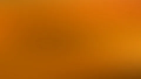 Weicher Farbverlauf in Orange und Ockertönen, in der Mitte etwas dunkler, zu den Rändern heller und leicht rötlich.