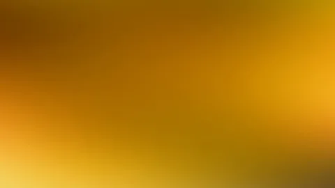 Unscharfer Farbverlauf von dunklem Braun oben links über Orange bis zu hellem Gelb unten links und Gold rechts.
