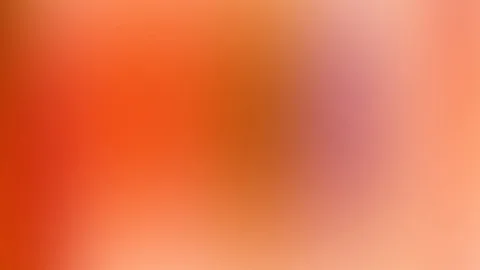Unscharfer Verlauf von Orangerot über Rosa zu hellem Pfirsichton