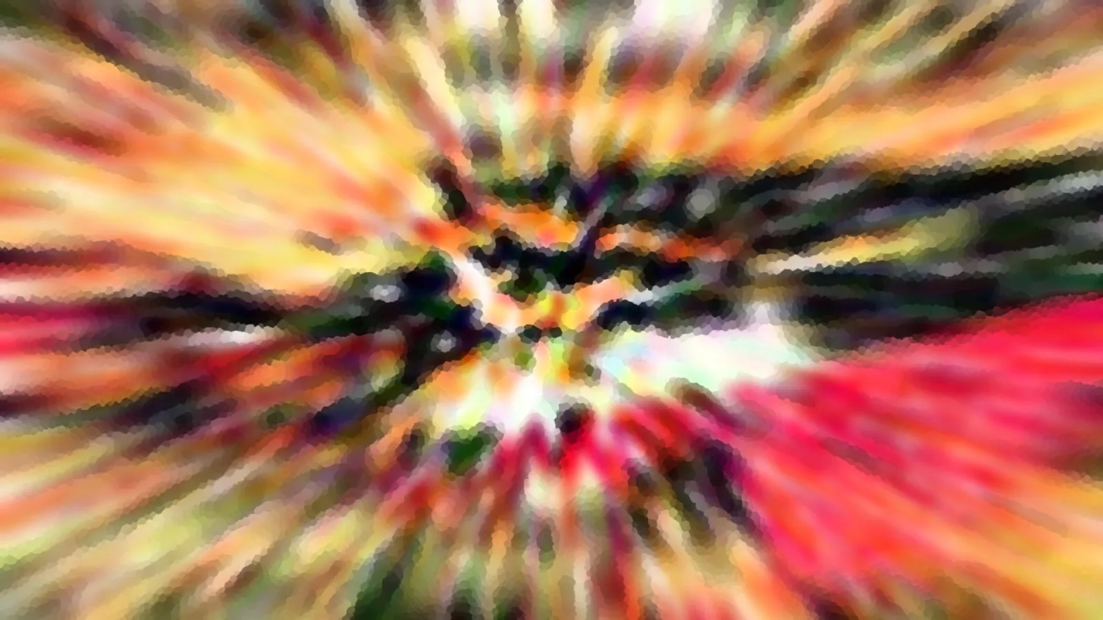 Abstraktes Bild mit radialen Farbstrahlen in Gelb, Orange, Rot und Grün, die von einem dunklen Zentrum nach außen laufen.