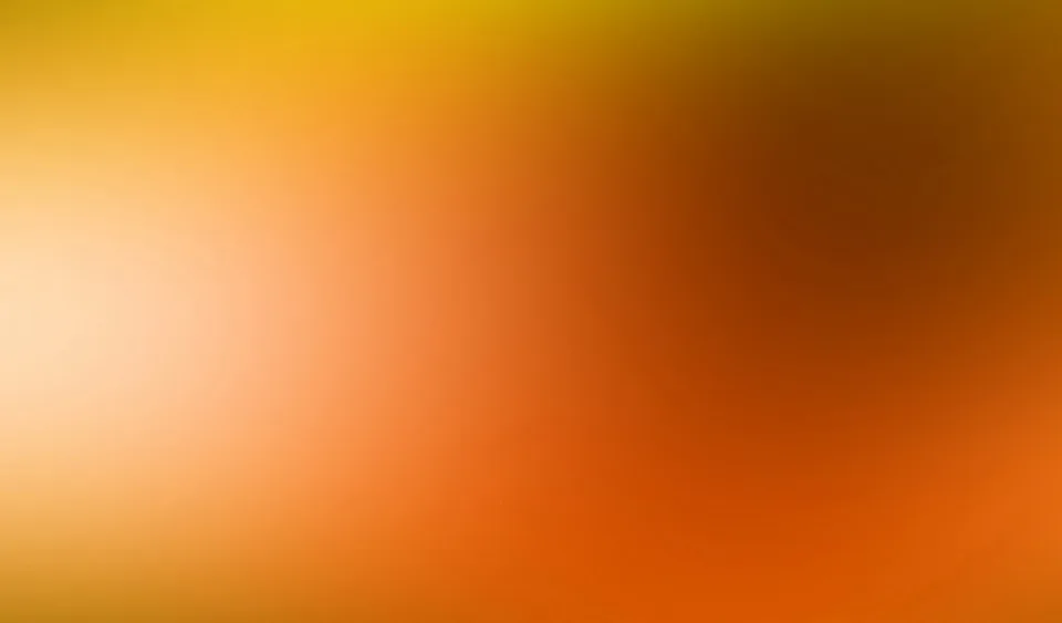 Weicher Farbverlauf von hellem Gelb oben links über Orange bis zu dunklem Braun oben rechts, ohne erkennbare Motive.