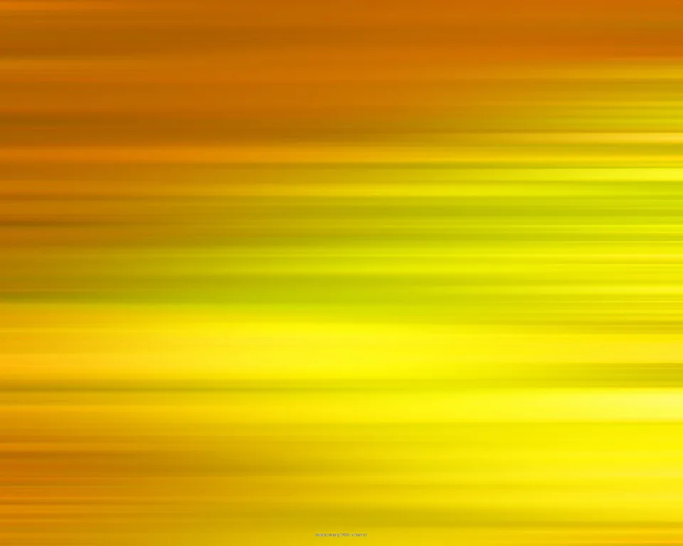 Horizontal verwischte Streifen, die oben in Orange und unten in leuchtendes Gelb mit grünlichen Übergängen übergehen.