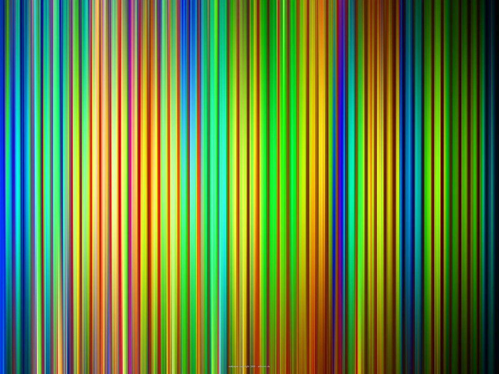 Dicht nebeneinander stehende vertikale Streifen in Blau, Grün, Gelb, Orange und Rot, die sich wie ein Farbverlauf von links nach rechts ziehen.