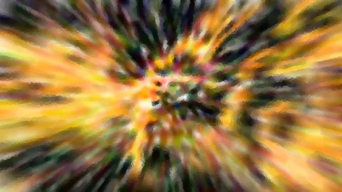 Abstraktes Bild mit radial von der Mitte nach außen laufenden Streifen in Orange, Gelb, Grün und Schwarz, mosaikartig gepixelt.
