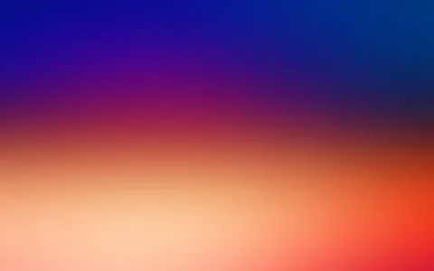 Weicher Farbverlauf von dunklem Blau oben über Violett und Rot zu hellem Orange und Pfirsich unten.