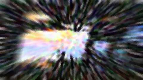Abstraktes Bild mit radialer Bewegungsunschärfe, von einem hellen Zentrum in Regenbogenfarben nach außen in dunkle Grün- und Violetttöne ausstrahlend.