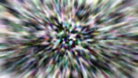 Abstraktes Bild mit bunten, von der Mitte nach außen laufenden Schlieren in Grün, Violett und Weiß, grob verpixelt wirkend.