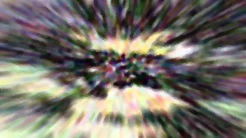 Abstraktes Bild mit farbigen Streifen, die von einem hellen Zentrum radial nach außen laufen, grob gerastert wie ein Mosaik.