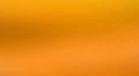 Unscharfer Farbverlauf in Orange und Gelb, oben heller, links und in der Mitte dunkler.