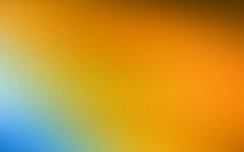 Weicher Farbverlauf: oben und rechts dunkles bis leuchtendes Orange, links unten und links oben Blau und helles Türkis, dazwischen Gelb.
