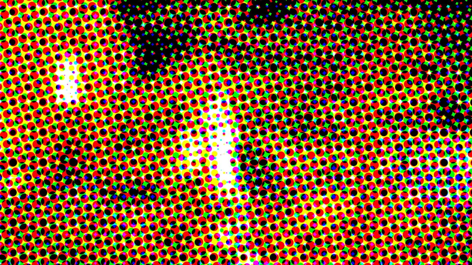 Dichtes Raster aus runden Punkten in Rot, Grün, Gelb, Blau und Schwarz, mit einem hellen weißen Lichtfleck in der Bildmitte.