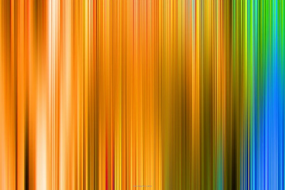 Vertikal verwischte Streifen in Orange, Gelb, Grün und Blau, die von links nach rechts ineinander übergehen.