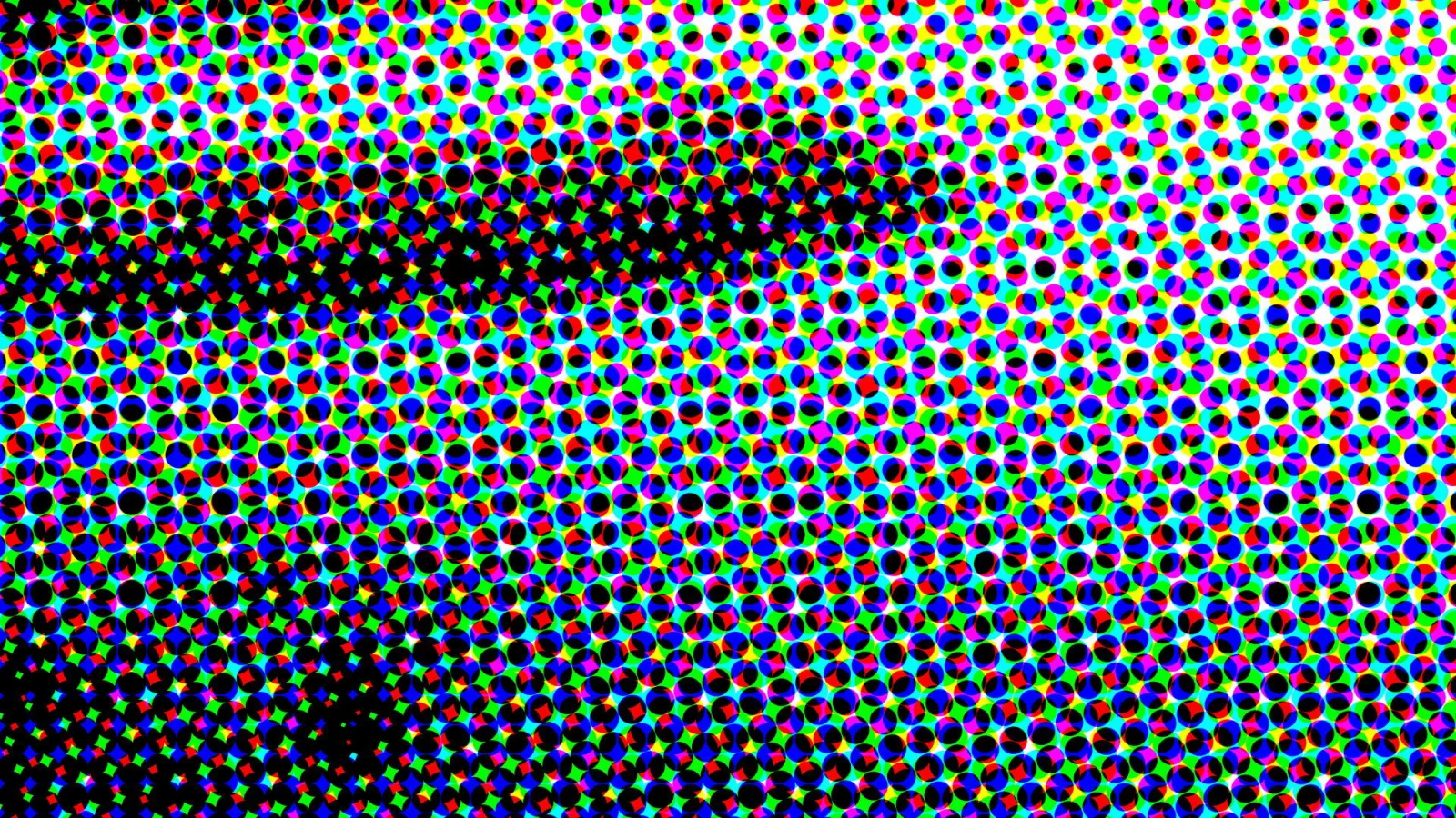 Dichtes Raster aus kleinen farbigen Punkten in Rot, Grün, Blau, Cyan, Magenta und Gelb auf weißem und schwarzem Grund, in der Mitte und unten links verdunkelt.