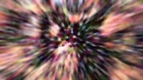 Abstraktes Bild aus bunten Farbschlieren in Rosa, Grün und Schwarz, die radial von einem dunklen Zentrum nach außen laufen.