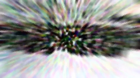 Radial verwischtes Bild mit pastellfarbenen Streifen und einem dunklen Zentrum