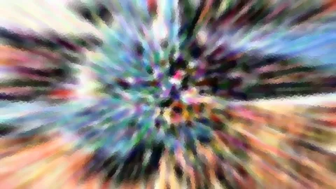 Abstraktes Bild mit bunten Strahlen, die von einem Zentrum in der Mitte nach außen laufen, grob gerastert und unscharf.