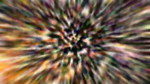 Abstrakter Farbwirbel mit radial verlaufenden Streifen in Grün, Orange, Violett und Weiß, das Zentrum liegt in der Bildmitte.