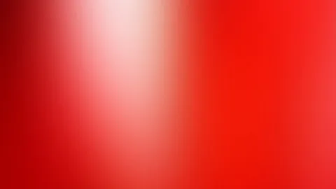 Weicher roter Farbverlauf mit hellem Lichtschein im oberen linken Bereich, nach rechts hin dunkler und satter werdend.