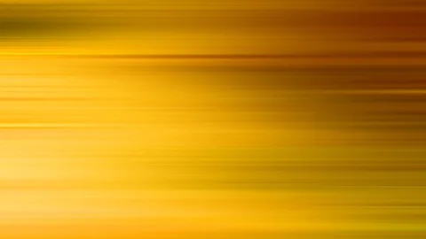 Horizontal verwischte Streifen in Gelb, Orange und Braun, rechts dunkler, links heller.