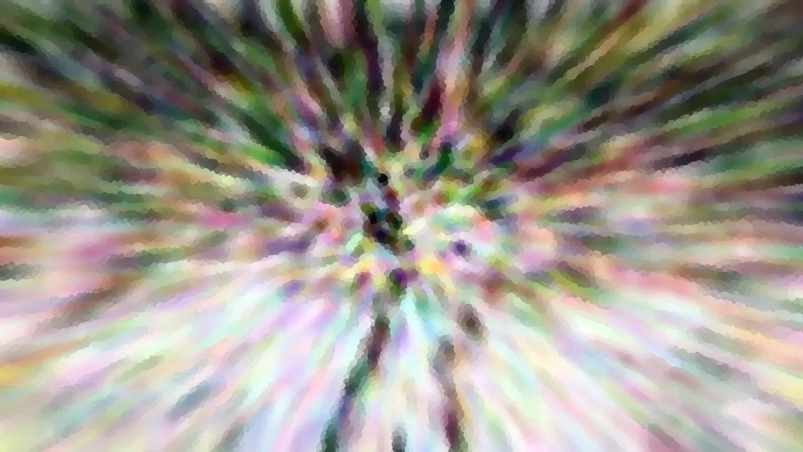 Abstrakter Radialzoom mit grünen, rosa und violetten Farbschlieren, die von einem dunkleren Zentrum nach außen laufen, pixelig gerastert.