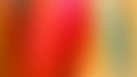 Abstrakter, unscharfer Farbverlauf von Rot und Orange über Braun bis zu einem hellen Olivgrün am rechten Rand.