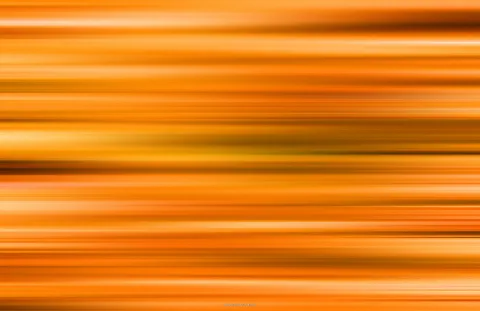 Horizontale, verwischte Streifen in Orange, Gelb und Braun, die wie eine schnelle Bewegung wirken.