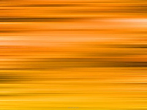 Horizontal verwischte Streifen in Orange, Gelb und Braun, die von oben nach unten dichter und heller werden.